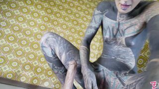 Alternative TATTOO model masturbating with big toy