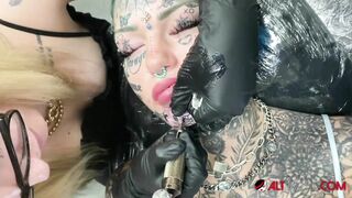 Australian Bombshell Amber Luke Gets a new Chin Tattoo