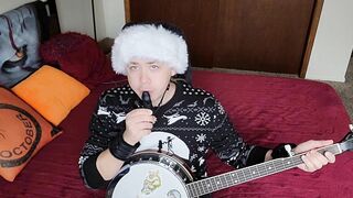 Transgirl Anally Masturbates while Playing Banjo
