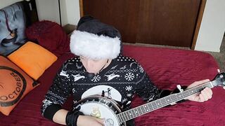 Transgirl Anally Masturbates while Playing Banjo