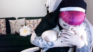 Naughty Nun Sucks her Tits